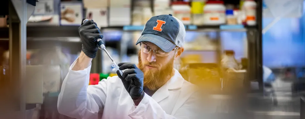 A University of Illinois chemical biology grad student purifies DNA for gene sequencing in a lab at the Carl R. Woese Institute for Genomic Biology.