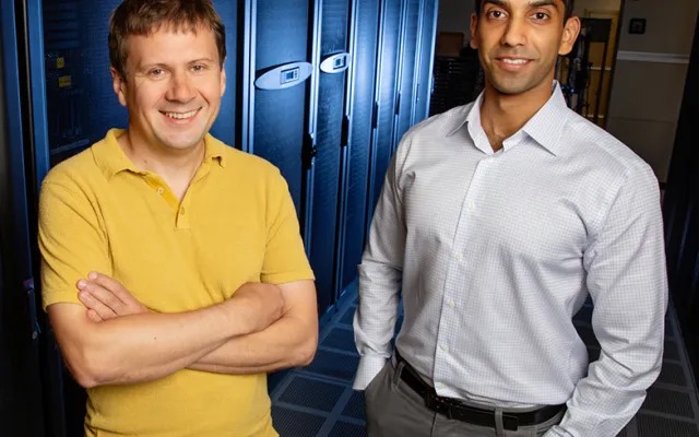 Physics professor Aleksei Aksimentiev, left, and graduate student Manish Shankla. 