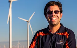 Graduate student Lucas Buccafusca looks for ways to improve the efficiency of wind farms. He had a key insight on a foggy day near a wind farm in central Illinois. 